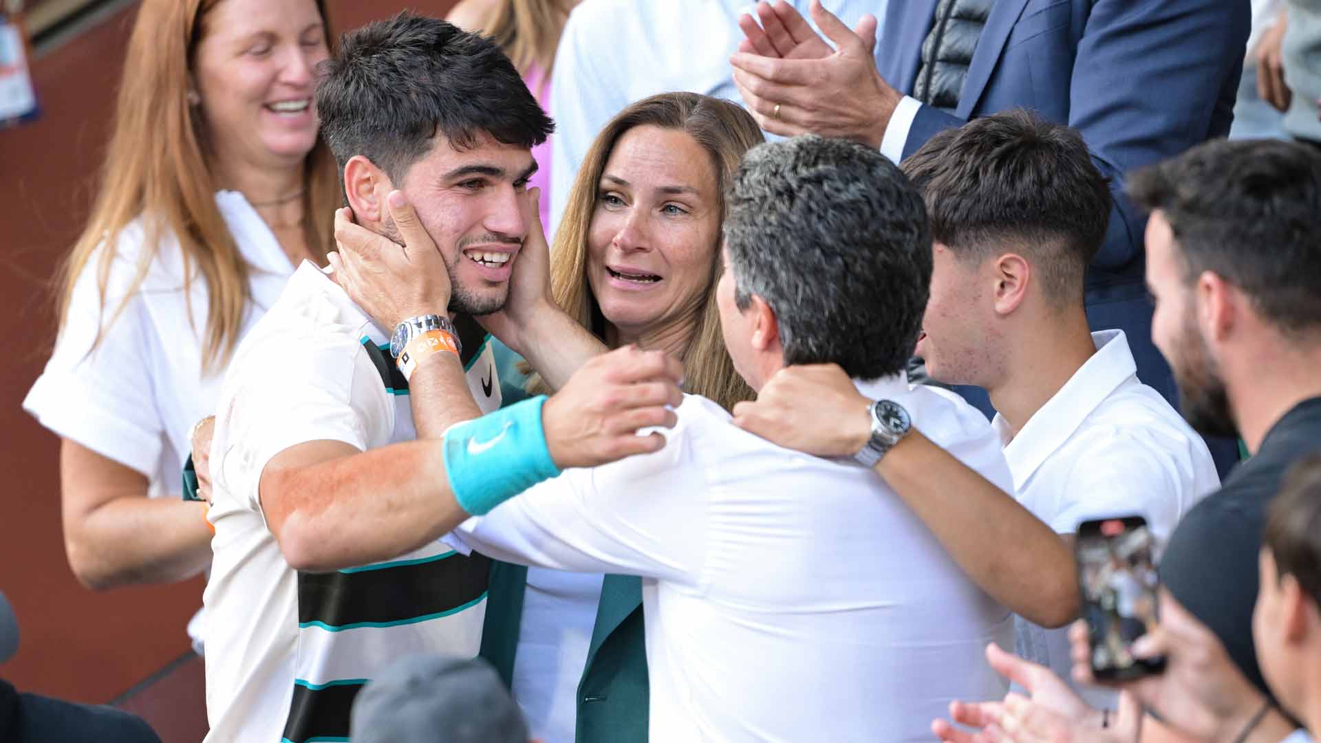 Carlos Alcaraz and his family celebrate after the Spaniard's five-set victory against Jannik Sinner in the Roland Garros final.