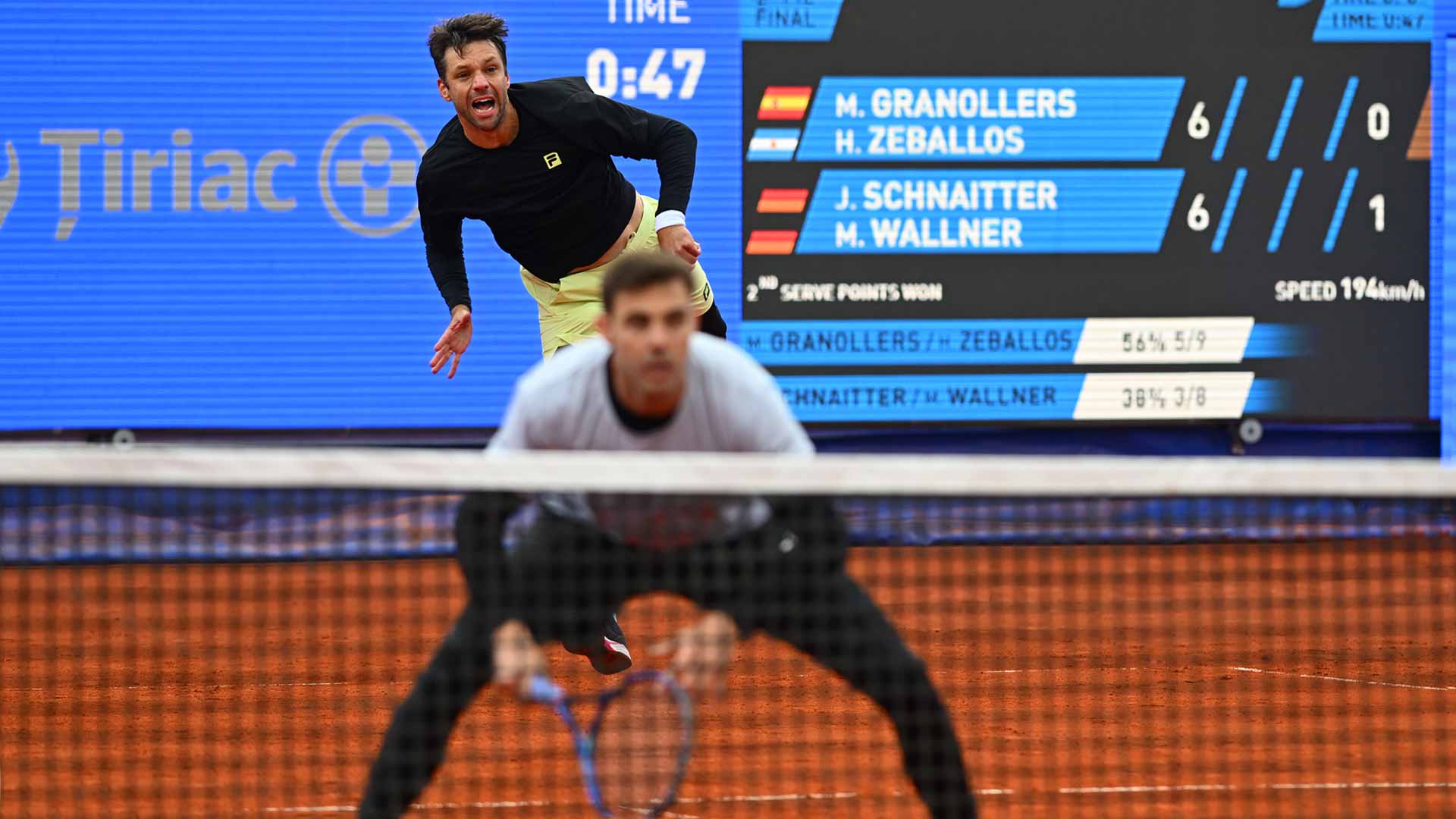 Horacio Zeballos and Marcel Granollers in action on Sunday during the Bucharest championship match.
